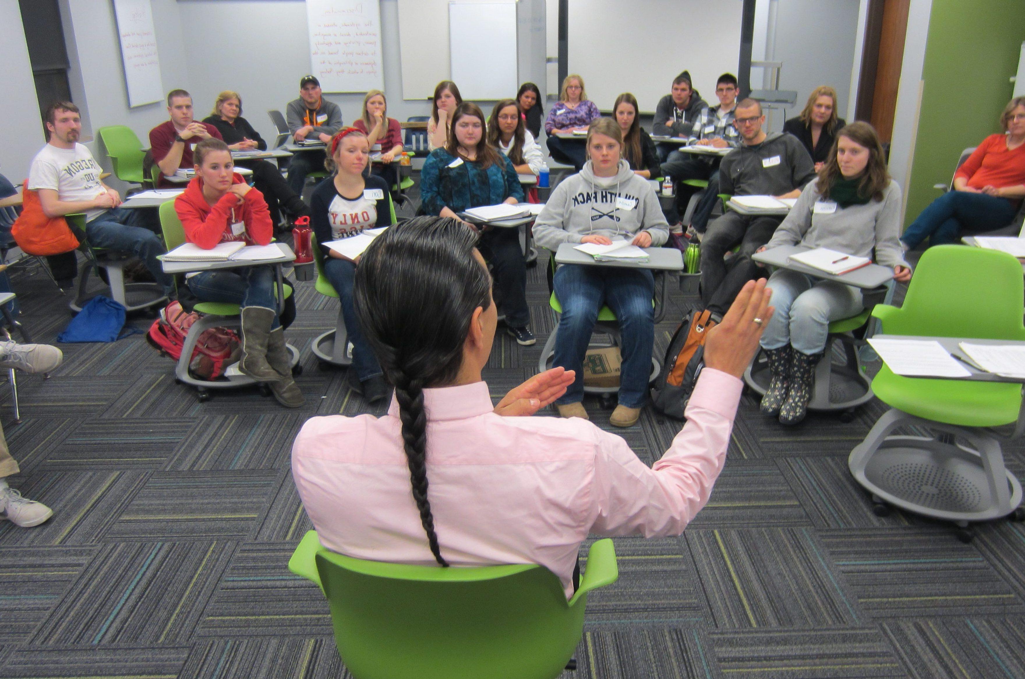 Small group of students learning from a teacher